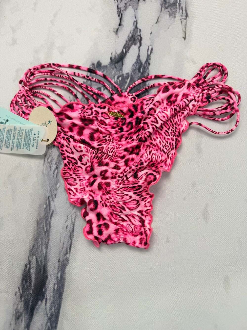 Luli Fama Wild Thing Strappy Ruched Back Bikini Bottom in Neon Pink